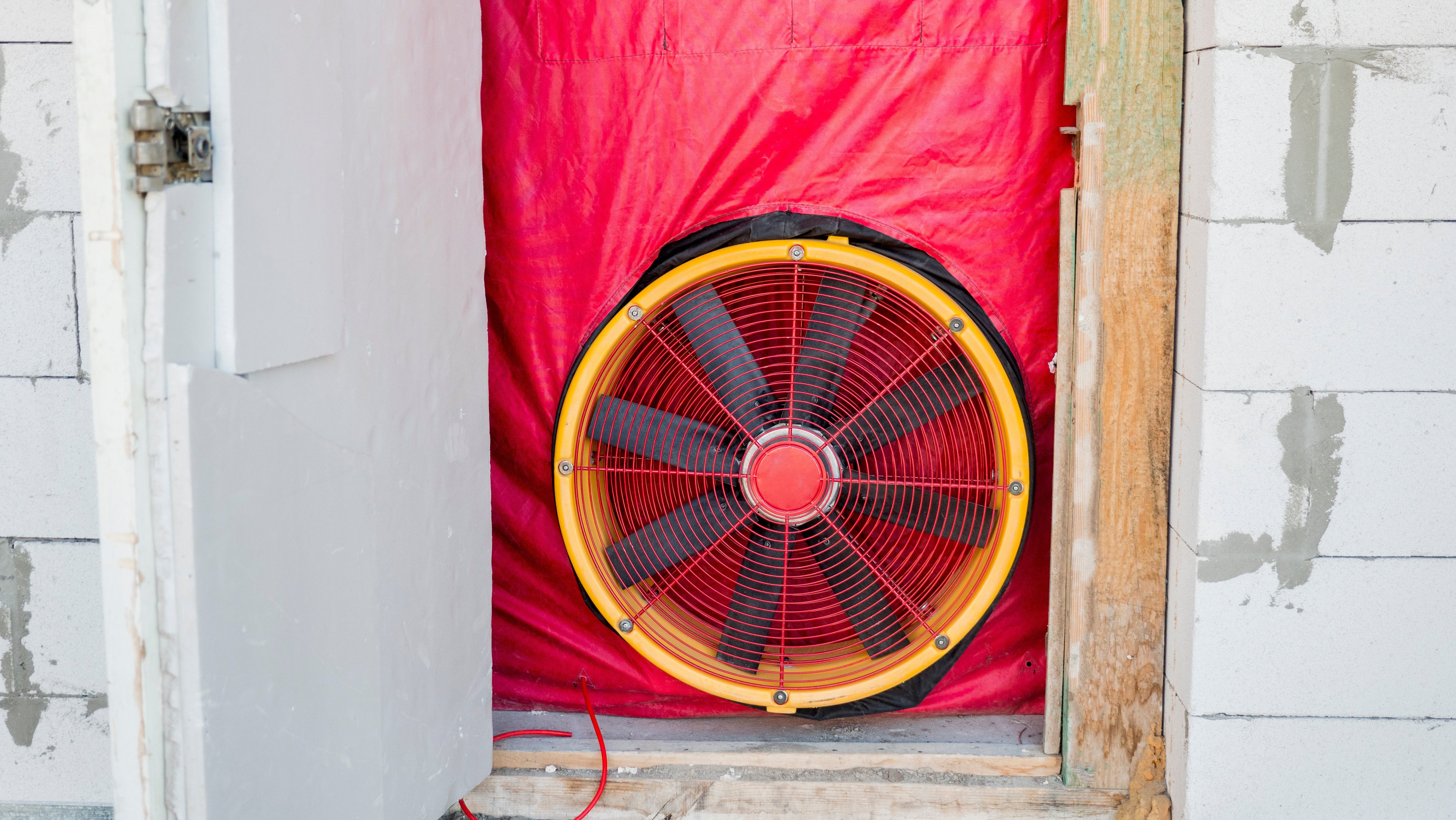 Blower door test: Testing the house for airtightness, on the front door installed a powerful fan.